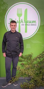 Foto von Andreas Voigt vor dem Frischraum